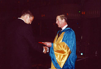 Jamses Grace receiving Tagore Prize from Prince Carlo